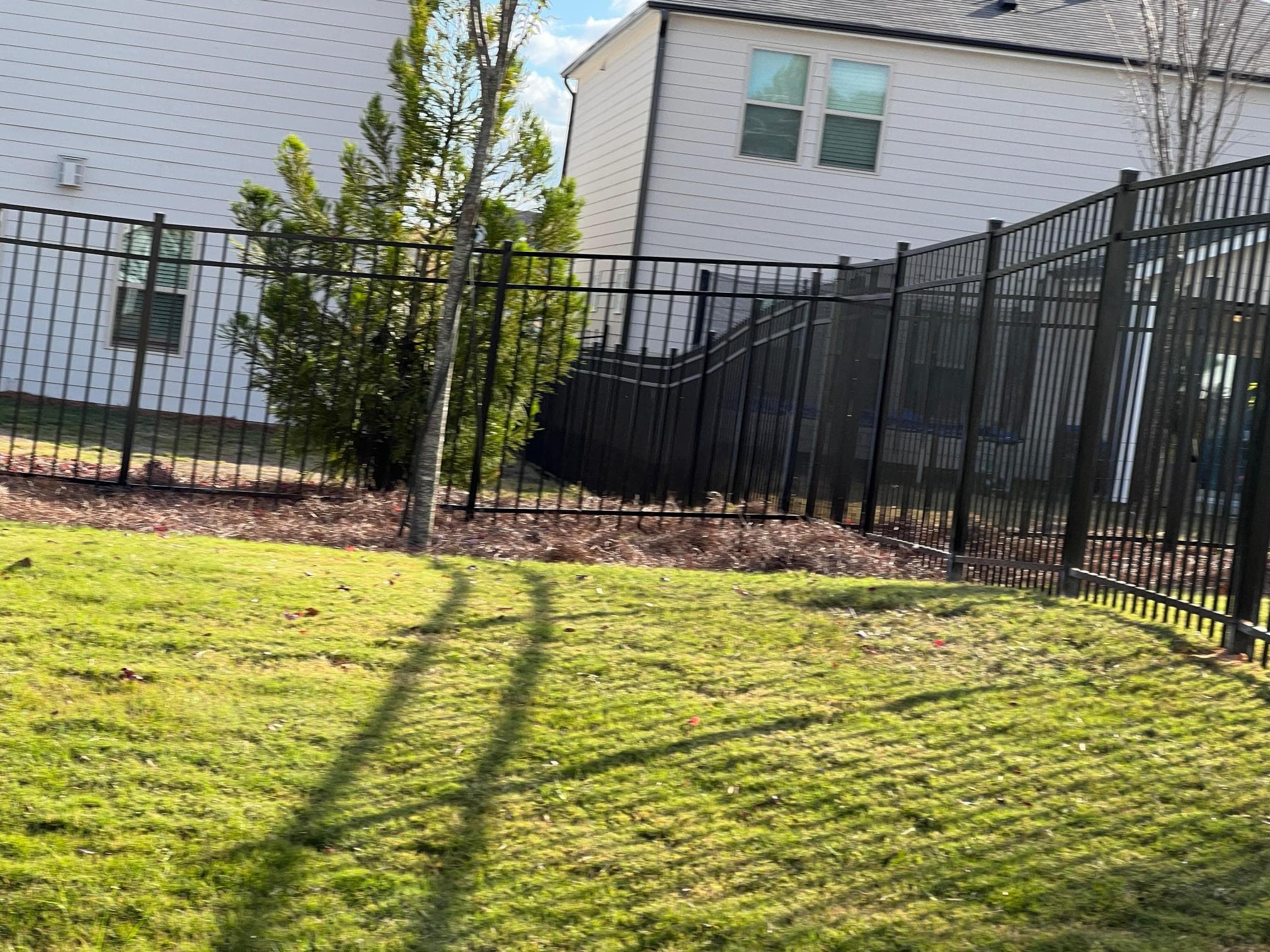 Custom driveway gate with automatic opener in Metro Atlanta